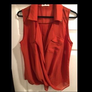 Orange sleeveless blouse